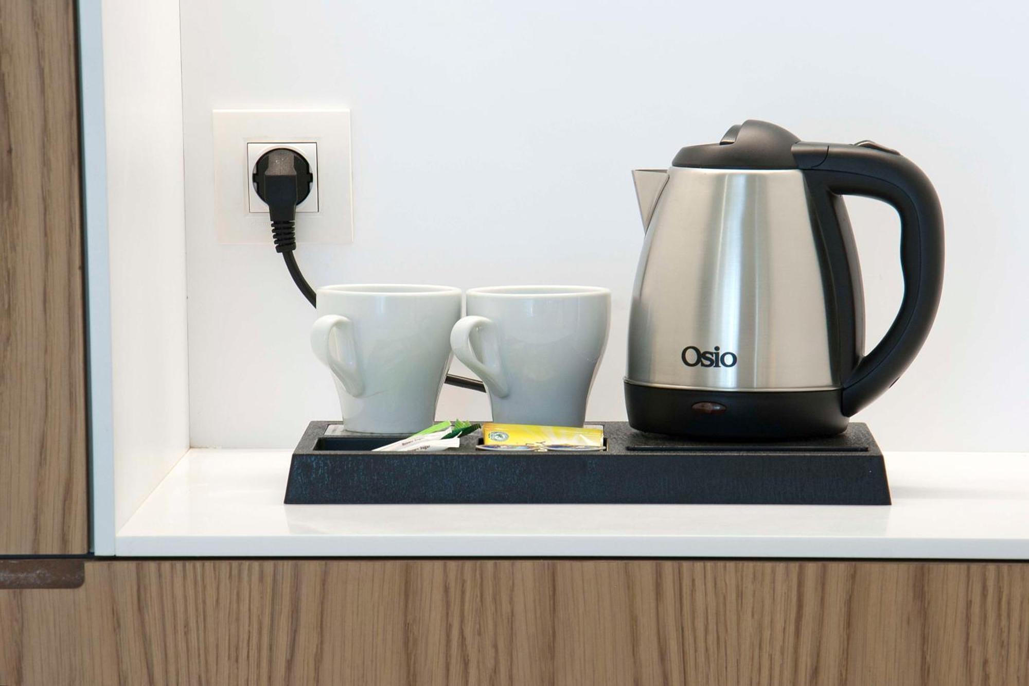 Radisson Blu Kochi Hotel Eksteriør billede A kettle